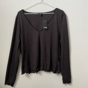 Torrid long sleeve v neck top.